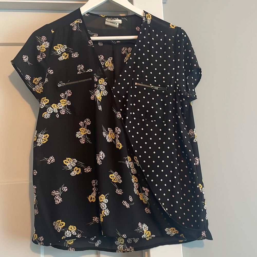 Maurices blouse.  Size M.  Wrap front with zipper pockets.